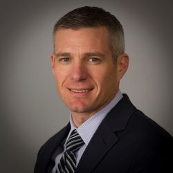 Portrait of man in suit and tie